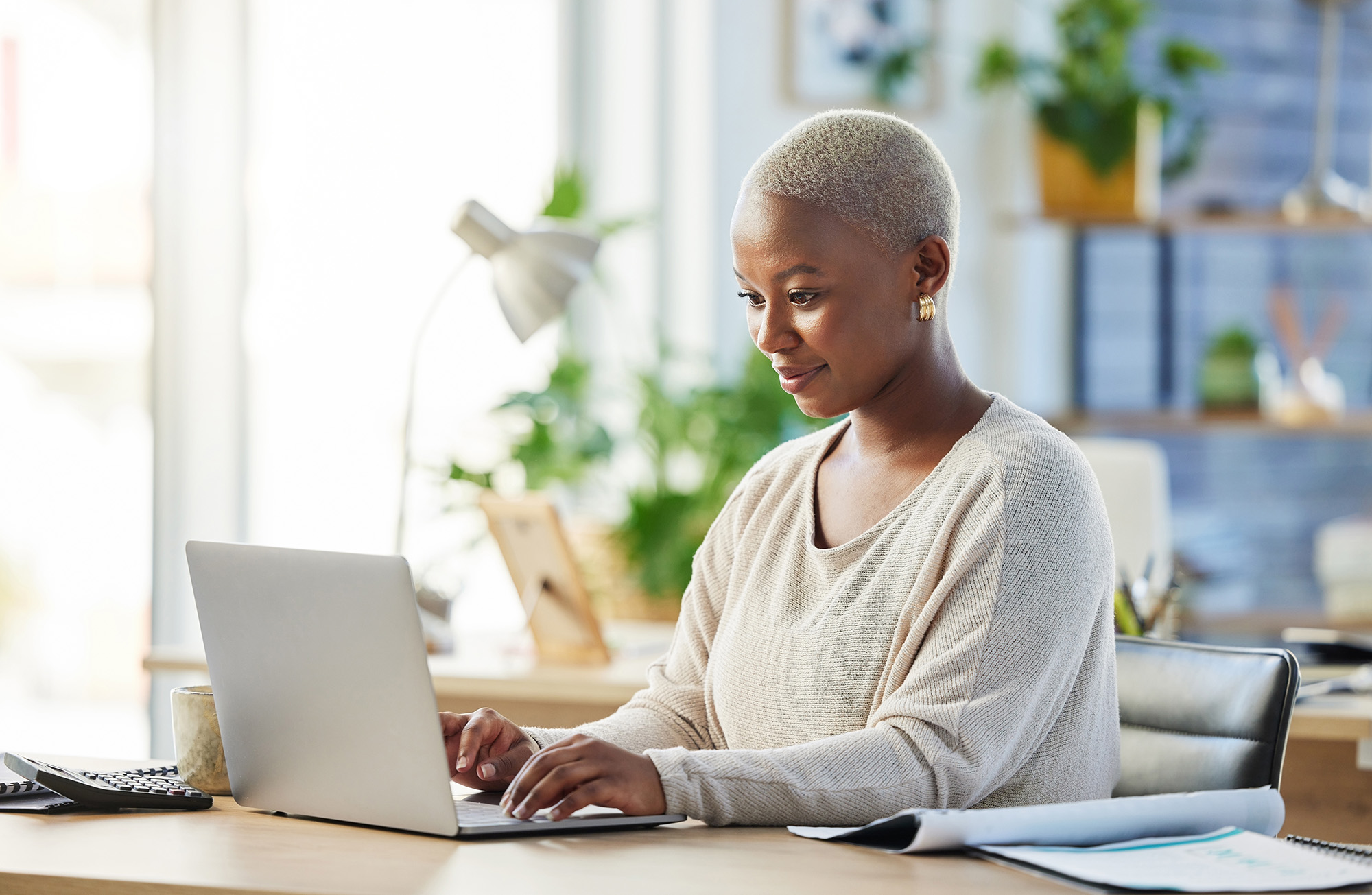 woman searching for house cleaning on google